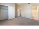 Bedroom features include carpet, light walls, closet, and attached bathroom at 2152 Jasper Bluff St # 103, Las Vegas, NV 89117