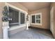 Charming entryway featuring decorative columns and ample natural light streaming through the windows at 2152 Jasper Bluff St # 103, Las Vegas, NV 89117