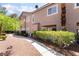 Exterior view of the property with well-maintained landscaping and mature trees at 2152 Jasper Bluff St # 103, Las Vegas, NV 89117