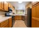 Functional kitchen featuring stainless steel appliances, ample counter space, and natural light at 2152 Jasper Bluff St # 103, Las Vegas, NV 89117