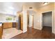 Open concept kitchen with stainless steel appliances and hardwood floors at 2152 Jasper Bluff St # 103, Las Vegas, NV 89117