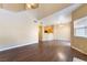 Open-concept living room featuring wood floors, natural light, and high ceilings at 2152 Jasper Bluff St # 103, Las Vegas, NV 89117