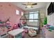bedroom with a play area, toys, and a fun, colorful design at 2169 Rio Rancho Pointe Pl, Henderson, NV 89002