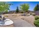 Beautiful community park with walking paths, benches, and lush greenery at 2169 Rio Rancho Pointe Pl, Henderson, NV 89002