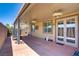 Spacious covered patio with ceiling fans, ideal for enjoying the outdoors year-round at 2169 Rio Rancho Pointe Pl, Henderson, NV 89002