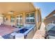 Inviting covered patio features a stylish seating area, perfect for outdoor relaxation at 2169 Rio Rancho Pointe Pl, Henderson, NV 89002