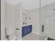 Modern bathroom with frameless glass shower and vanity cabinet at 2402 El Cid Ct, Henderson, NV 89014
