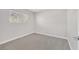 Bedroom with carpet floor, white trim and large window at 2402 El Cid Ct, Henderson, NV 89014
