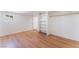 Finished basement with ample space and a built-in bookshelf for storage at 2481 San Marcos St, Las Vegas, NV 89115