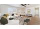 Bright living room features an open floorplan, neutral tones, and hardwood floors at 2481 San Marcos St, Las Vegas, NV 89115