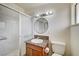 Bathroom featuring a shower and vanity with granite counter at 2496 Golfers St, Las Vegas, NV 89142