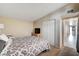 Bedroom featuring neutral carpet, closet and hallway access at 2496 Golfers St, Las Vegas, NV 89142
