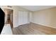 Bedroom featuring wood-look floors and a large closet at 2496 Golfers St, Las Vegas, NV 89142
