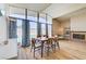 Dining room with ample windows and a view of the pool at 2496 Golfers St, Las Vegas, NV 89142