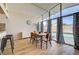 Modern dining area with a view of the backyard pool at 2496 Golfers St, Las Vegas, NV 89142