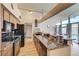 Well-equipped kitchen with dark granite countertops and stainless steel appliances at 2496 Golfers St, Las Vegas, NV 89142