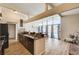 Updated kitchen with breakfast bar overlooking dining area and backyard pool at 2496 Golfers St, Las Vegas, NV 89142