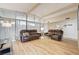 Spacious living room with a skylight and modern furnishings at 2496 Golfers St, Las Vegas, NV 89142