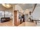 Open living area with recessed lights and kitchen view, great for entertaining at 2496 Golfers St, Las Vegas, NV 89142