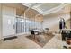 Enclosed patio offers a relaxing space with ample seating, skylights, and a stylish outdoor rug at 2496 Golfers St, Las Vegas, NV 89142