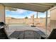 Backyard pool for outdoor fun and relaxation, surrounded by lounge chairs and patio area at 2496 Golfers St, Las Vegas, NV 89142