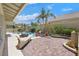 Enjoy outdoor living with a built-in grill, pool, spa, and lush landscaping at 2555 Antique Blossom Ave, Henderson, NV 89052