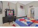 Comfortable bedroom with Americana decor and sliding closet doors at 2555 Antique Blossom Ave, Henderson, NV 89052