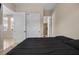 This bedroom features neutral walls, a closet, and bright natural lighting at 2577 Luberon Dr, Henderson, NV 89044