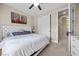 Bright bedroom with ceiling fan features natural lighting and closet at 2577 Luberon Dr, Henderson, NV 89044