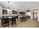 Dining room next to modern kitchen with stainless steel appliances at 2577 Luberon Dr, Henderson, NV 89044