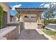 Attached garage with double doors and stone facade at 2577 Luberon Dr, Henderson, NV 89044