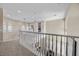 Loft with natural light and decorative railing overlooking downstairs at 2577 Luberon Dr, Henderson, NV 89044