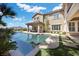 Stunning pool with a lush green yard creates a serene outdoor retreat at 2577 Luberon Dr, Henderson, NV 89044