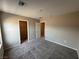 Bedroom with plush carpet, neutral walls and closet access at 2620 Tolmezzo St, Henderson, NV 89044