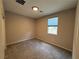 Comfortable bedroom features carpeted floors, a window with blinds, and ample space for furniture at 2620 Tolmezzo St, Henderson, NV 89044