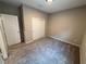 Inviting bedroom featuring carpeting, a closet, and neutral walls, providing a cozy retreat at 2620 Tolmezzo St, Henderson, NV 89044