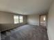 Spacious loft area with large windows and plush carpeting at 2620 Tolmezzo St, Henderson, NV 89044