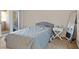 Comfortable bedroom with neutral decor and plenty of natural light at 2643 Red Rock St # 201, Las Vegas, NV 89146