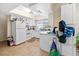 Bright kitchen featuring white cabinets, modern appliances, and ample counter space at 2643 Red Rock St # 201, Las Vegas, NV 89146