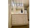 Bathroom featuring a vanity with storage cabinets, modern fixtures, and a large mirror at 2813 Painted Rose Ln, Henderson, NV 89074