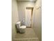 Modern bathroom featuring tiled walls, updated toilet, and modern fixtures at 2813 Painted Rose Ln, Henderson, NV 89074