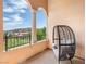 Relaxing balcony with seating and views of the surrounding landscape at 30 Via Vasari # 103, Henderson, NV 89011