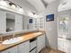 Bright bathroom with double sinks and a large window to bedroom at 30 Via Vasari # 103, Henderson, NV 89011