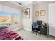 A comfortable bedroom with a study desk and a great view at 30 Via Vasari # 103, Henderson, NV 89011