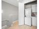 Convenient upstairs laundry area with stacked washer and dryer units at 30 Via Vasari # 103, Henderson, NV 89011