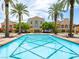 Luxury community pool with beautiful architecture, palm trees and pristine water at 30 Via Vasari # 103, Henderson, NV 89011