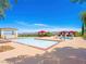 Community pool with cozy cabanas and desert views, perfect for relaxation at 30 Via Vasari # 103, Henderson, NV 89011