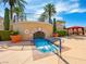 Inviting jacuzzi pool area with clear water, lush landscaping, and a shaded cabana for relaxation at 30 Via Vasari # 103, Henderson, NV 89011