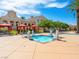 Beautiful community pool with sunning space, covered cabanas and attractive architecture at 30 Via Vasari # 103, Henderson, NV 89011