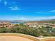 Expansive view overlooking the community homes and tranquil lake at 30 Via Vasari # 103, Henderson, NV 89011
